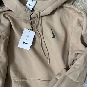 Nike Tan Hoodie with Green Swoosh. Billie Eilish collab.